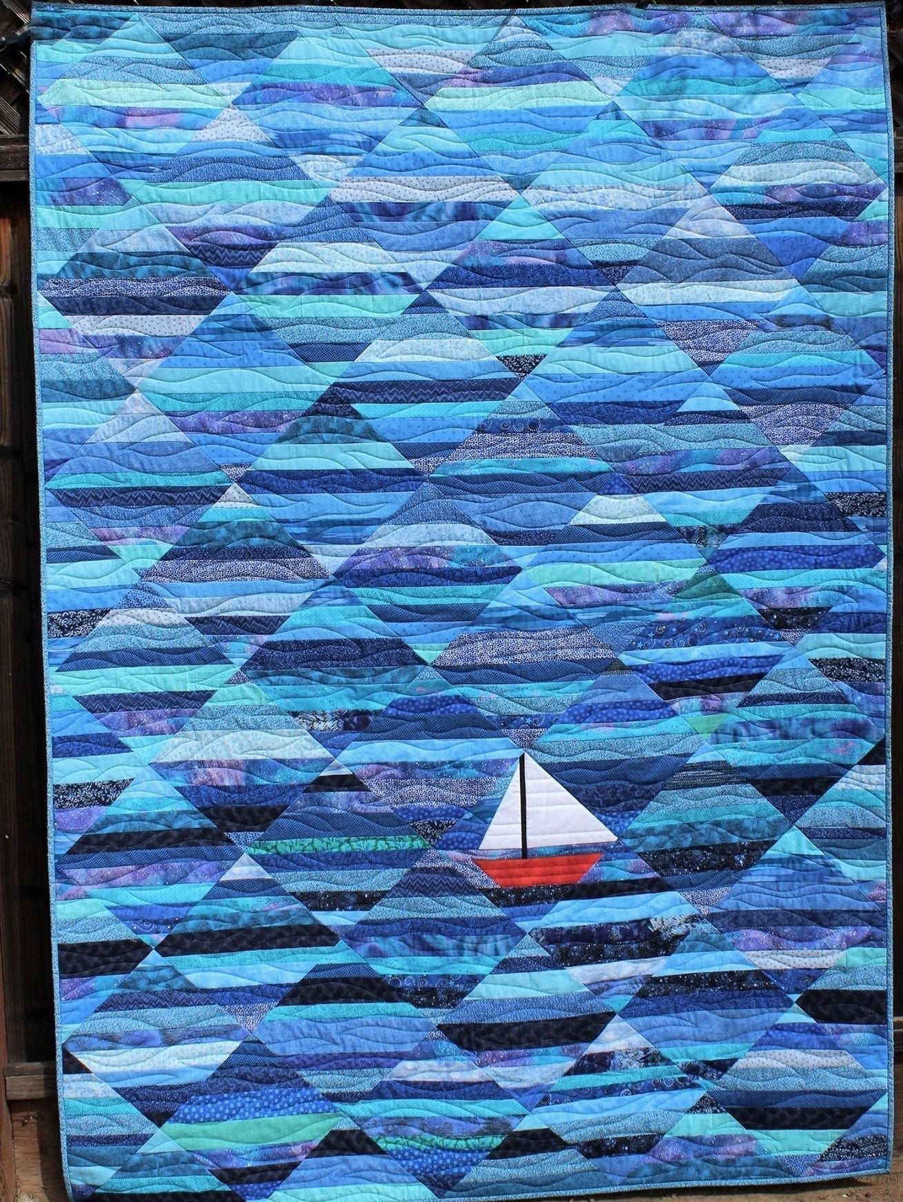 Red Boat Blue Sea Quilted Blanket - Throw (55" x 60")