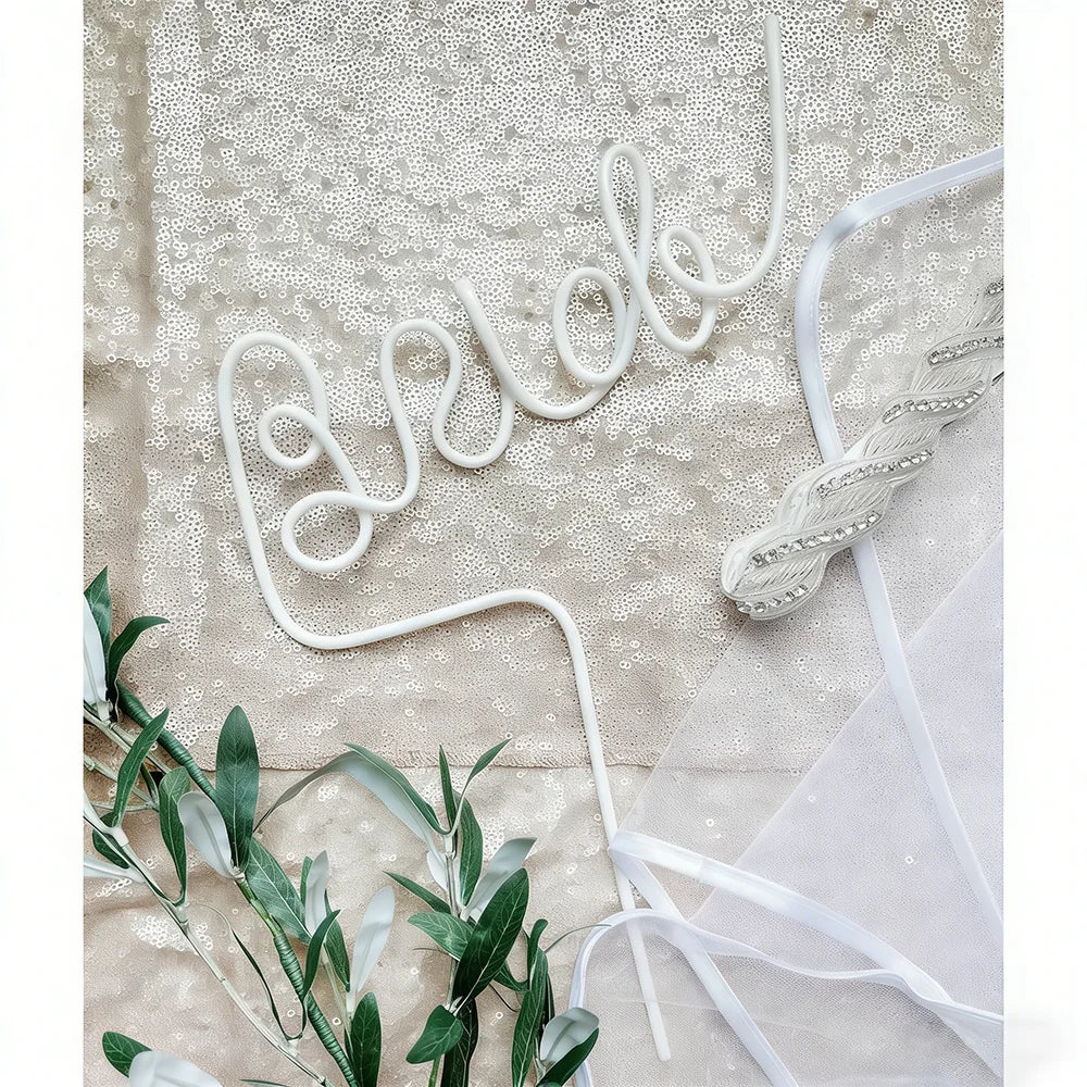 Pink bride drinking straw set for bachelorette party, shown in gift box bridal shower display.