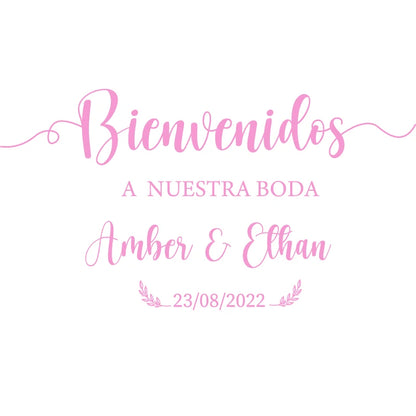 Personalized 'Bienvenidos' Spanish wedding welcome mirror decal in gold vinyl, shown on welcome sign board display.