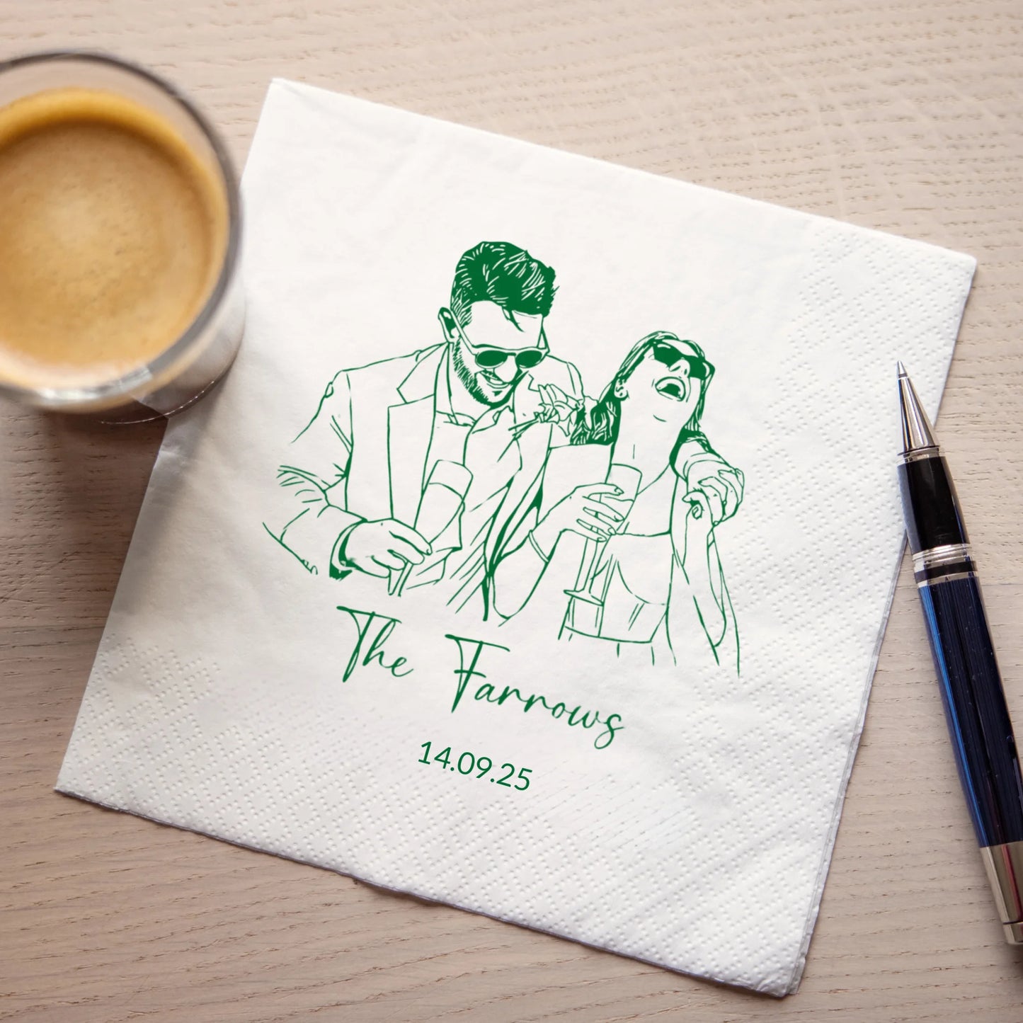 Personalized photo paper cocktail napkins with custom image and text, shown on wedding cocktail hour display.