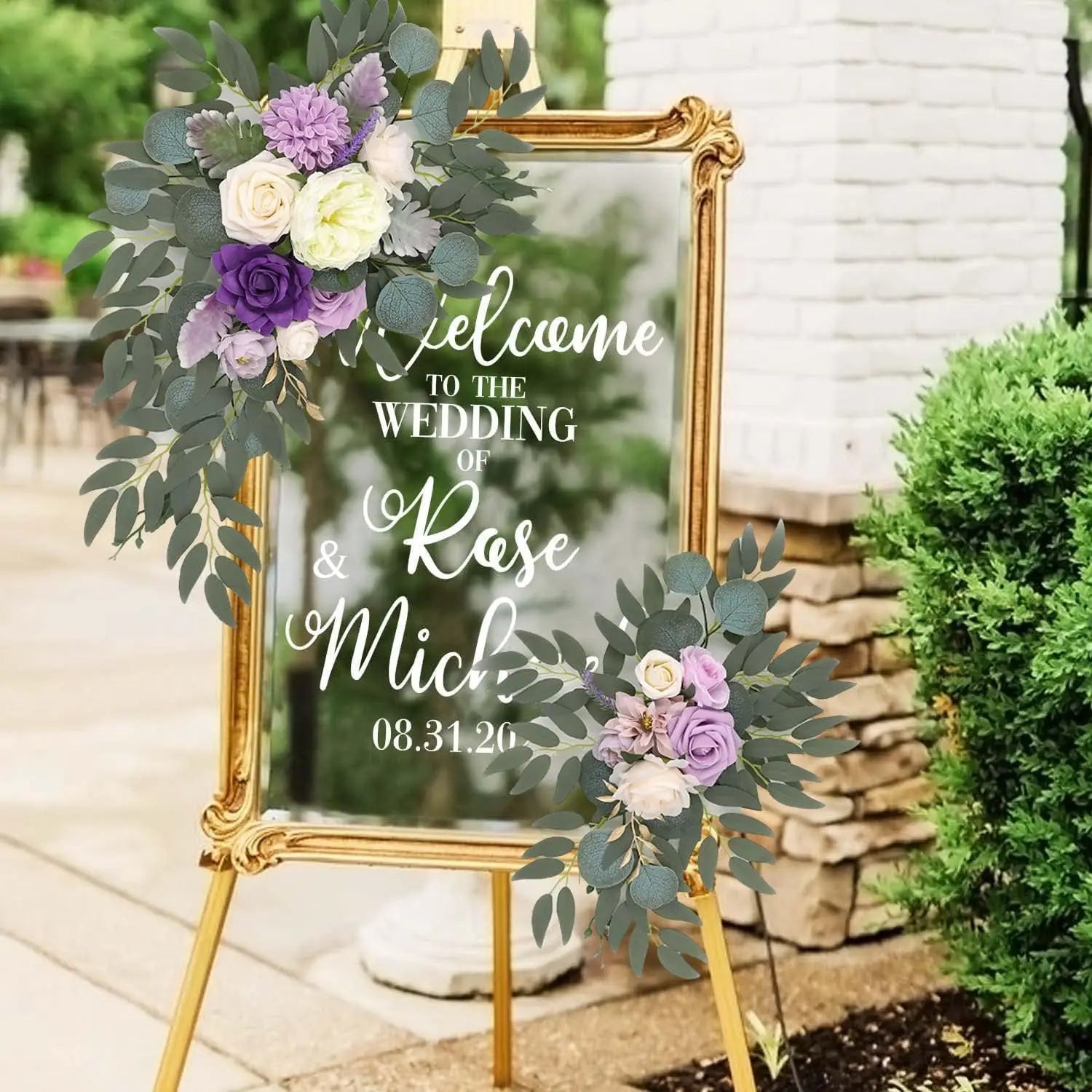 Artificial silk floral swag pair in champagne rose, shown on rustic wedding welcome sign backdrop.