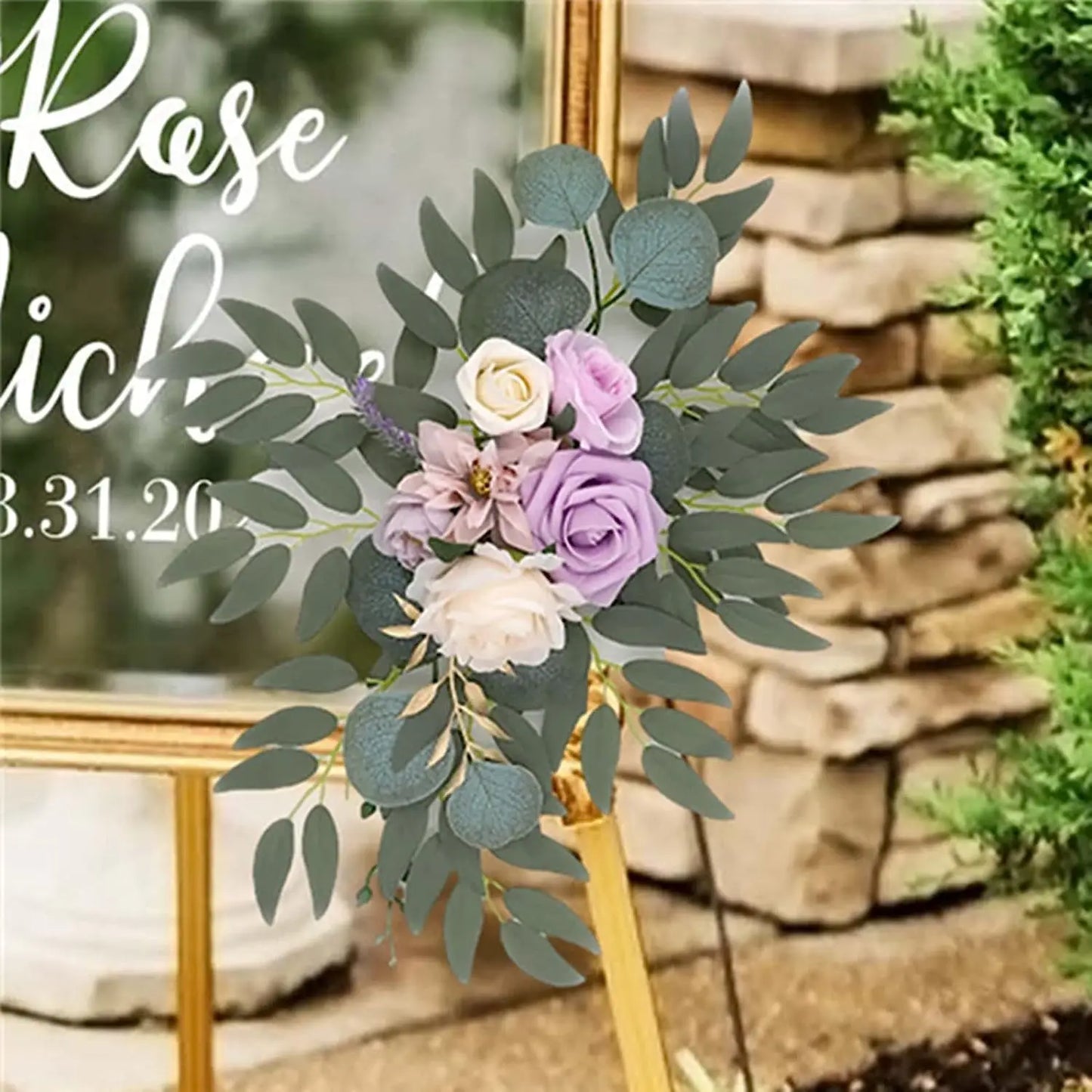 Artificial silk floral swag pair in champagne rose, shown on rustic wedding welcome sign backdrop.