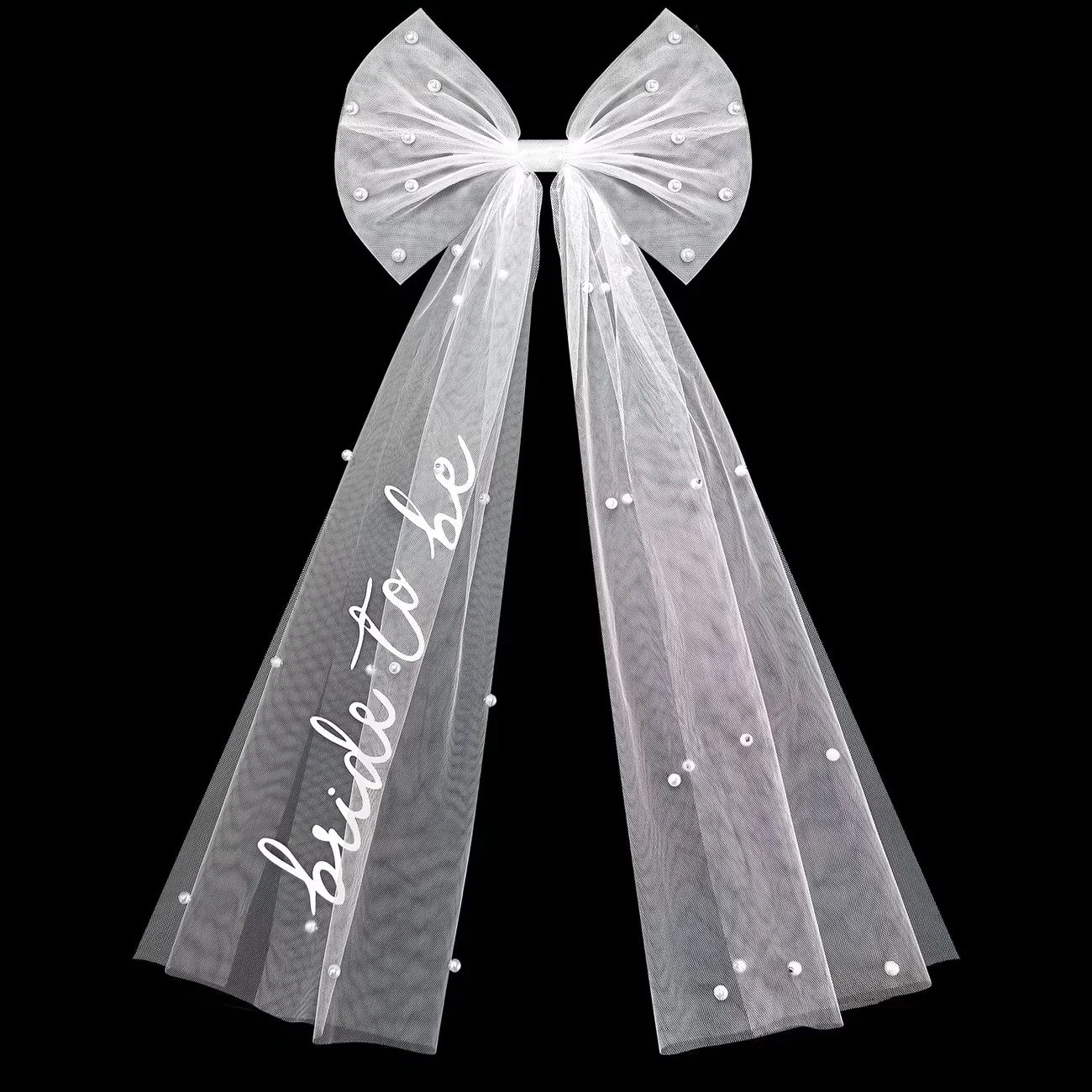Bride to be pearl curvy veil in white tulle with satin bow, shown on bachelorette headpiece display.