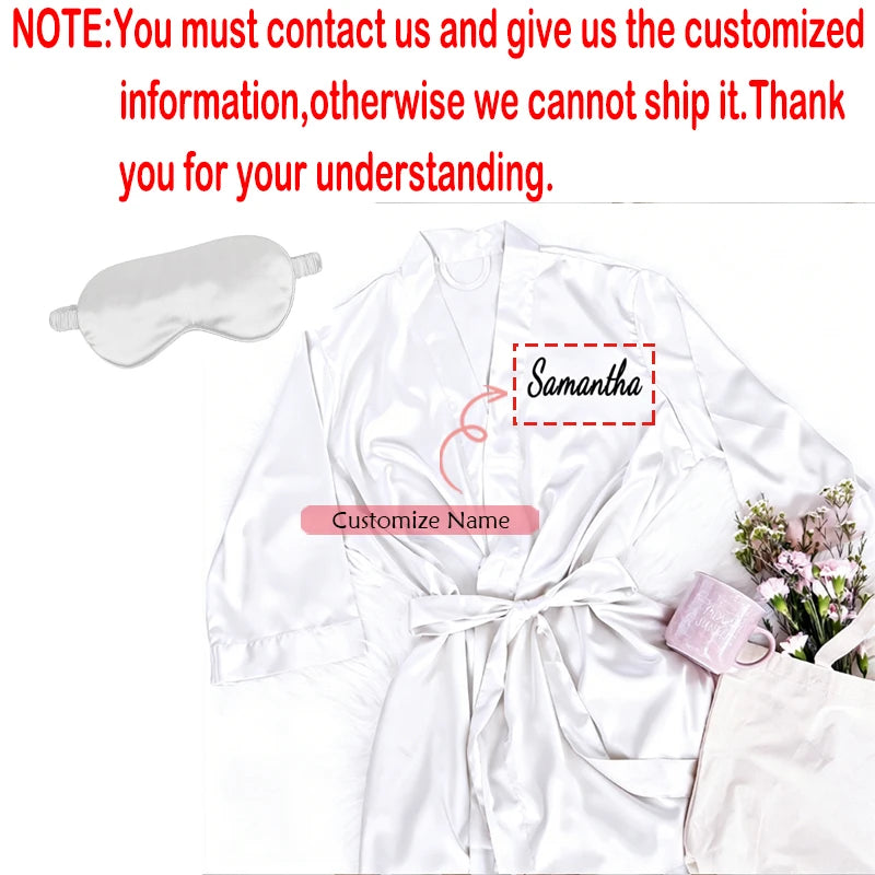 Personalized soft satin bridesmaid robe in custom pink with matching eye mask, shown on bachelorette gift display.