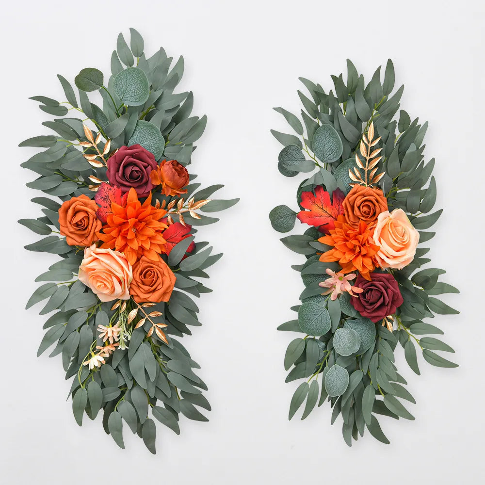 Artificial silk floral swag pair in champagne rose, shown on rustic wedding welcome sign backdrop.