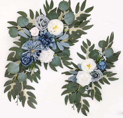 Artificial silk floral swag pair in champagne rose, shown on rustic wedding welcome sign backdrop.